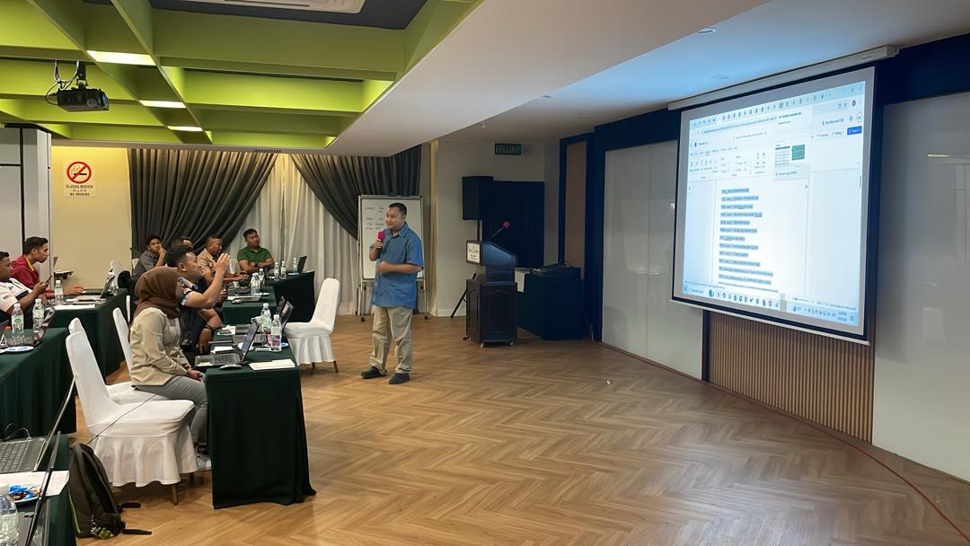 A group of people attending a digital literacy training session